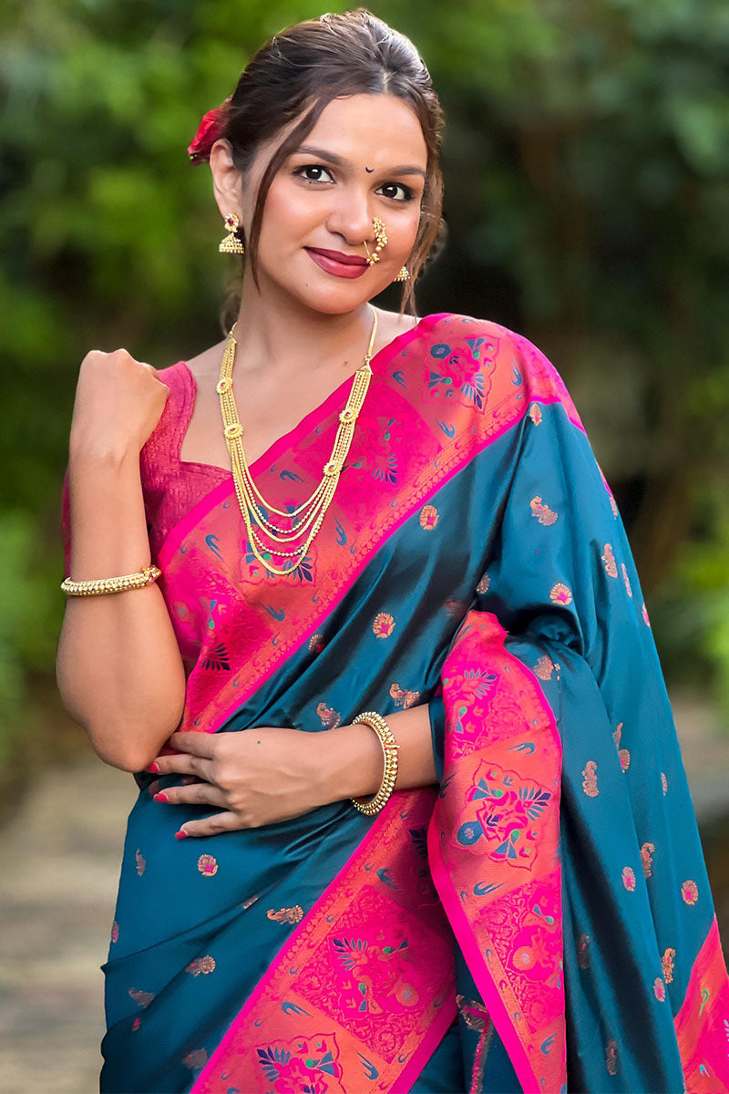 A dreamy Teal Blue Paithani Silk Saree With Demesne Blouse Piece