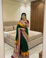 Seraphic Dark Green Banarasi Dola Silk Saree With Charismatic Blouse Piece