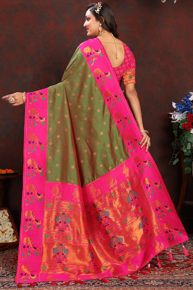 Entrancing Green Paithani Silk Saree With Majesty Blouse Piece