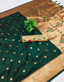 Capricious Dark Green Paithani Silk Saree With Glowing Blouse Piece