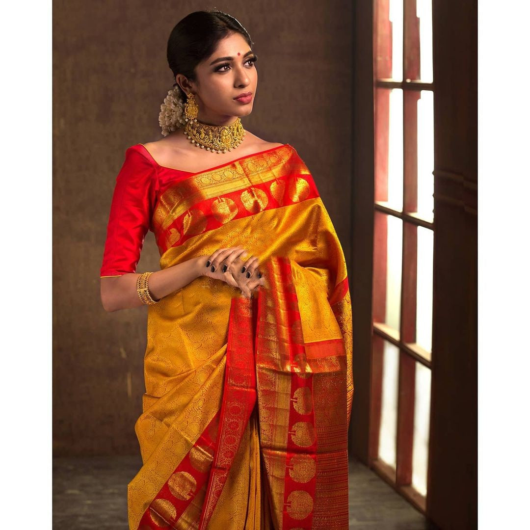 Desirable Yellow Soft Banarasi Silk Saree With Mellifluous Blouse Piece