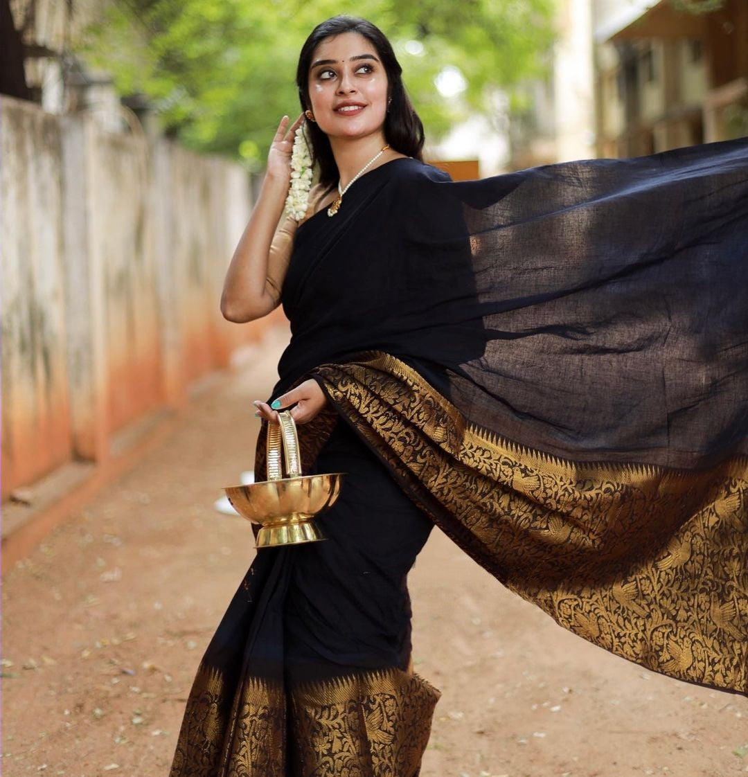 Flamboyant Black Soft Silk Saree With Delightful Blouse Piece