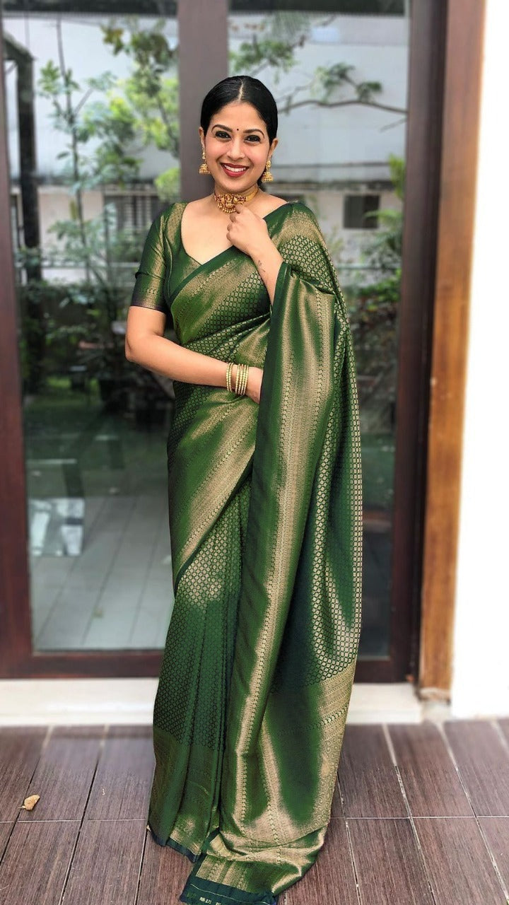 Sempiternal Green Soft Silk Saree With Sumptuous Blouse Piece