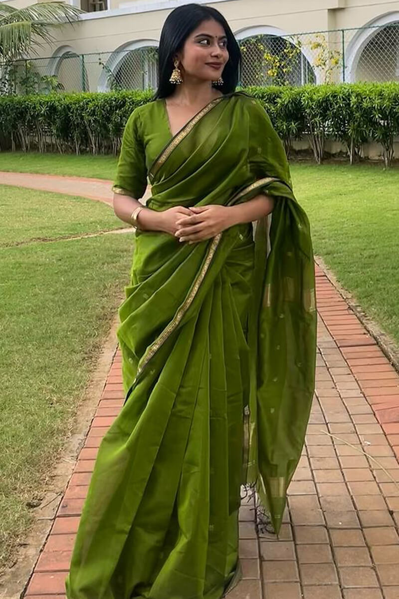 Luminous Green Cotton Silk Saree With Confounding Blouse Piece