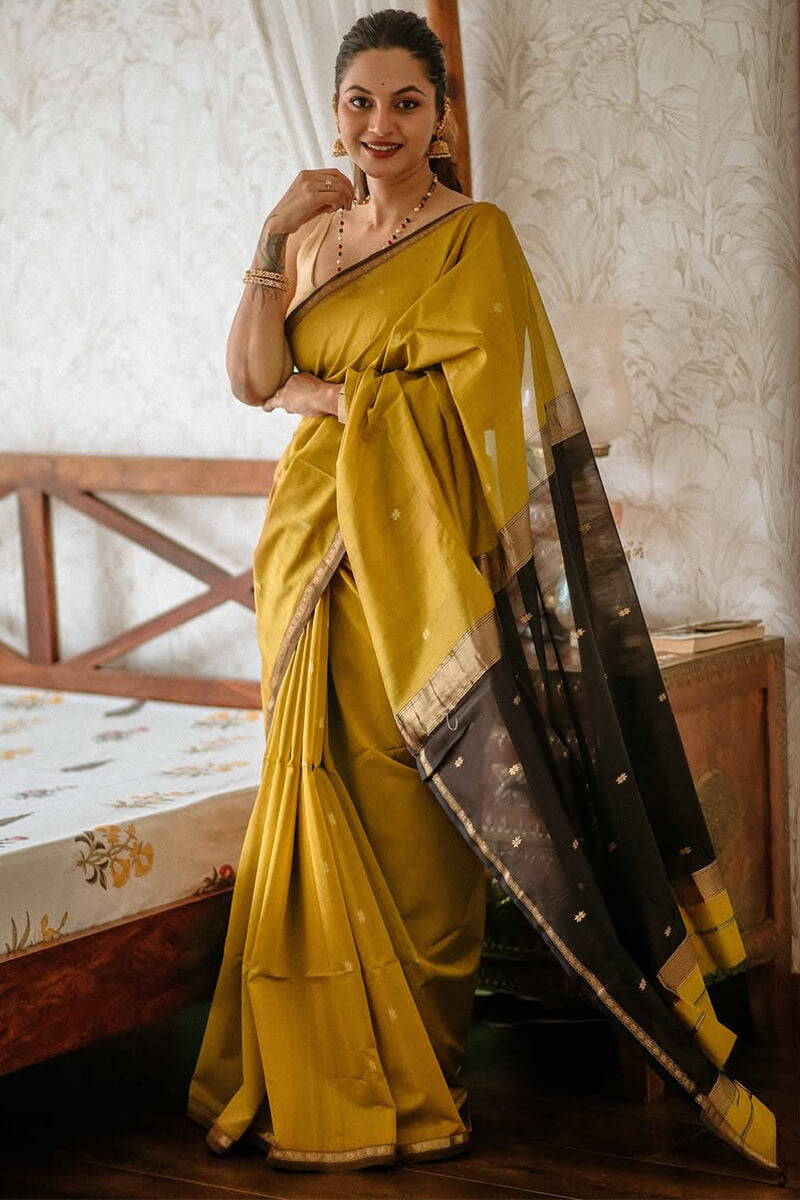 Charming Mustard Cotton Silk Saree With Glorious Blouse Piece