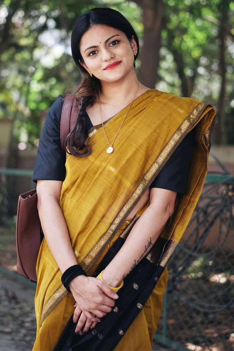 Gratifying Mustard Cotton Silk Saree With Enthralling Blouse Piece