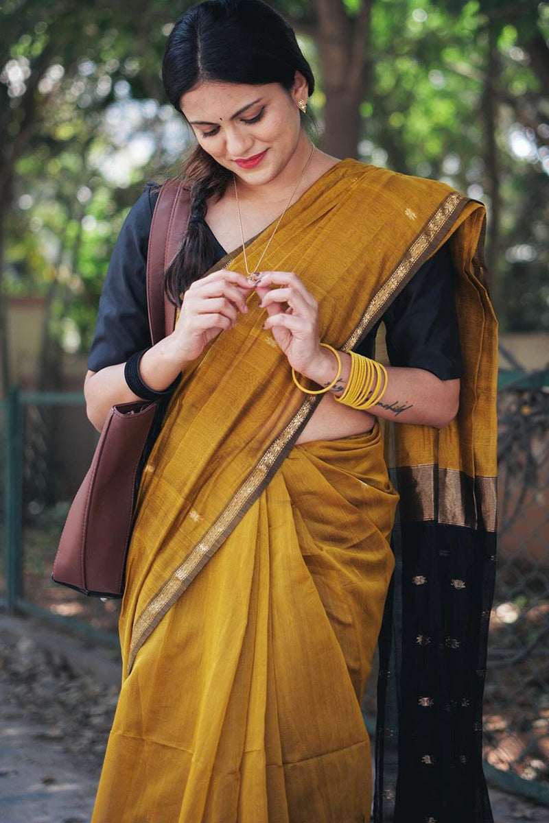 Gratifying Mustard Cotton Silk Saree With Enthralling Blouse Piece