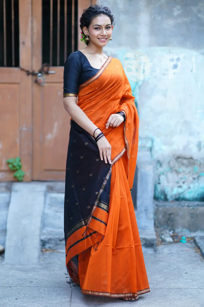 Intricate  Orange Cotton Silk Saree With Staring Blouse Piece