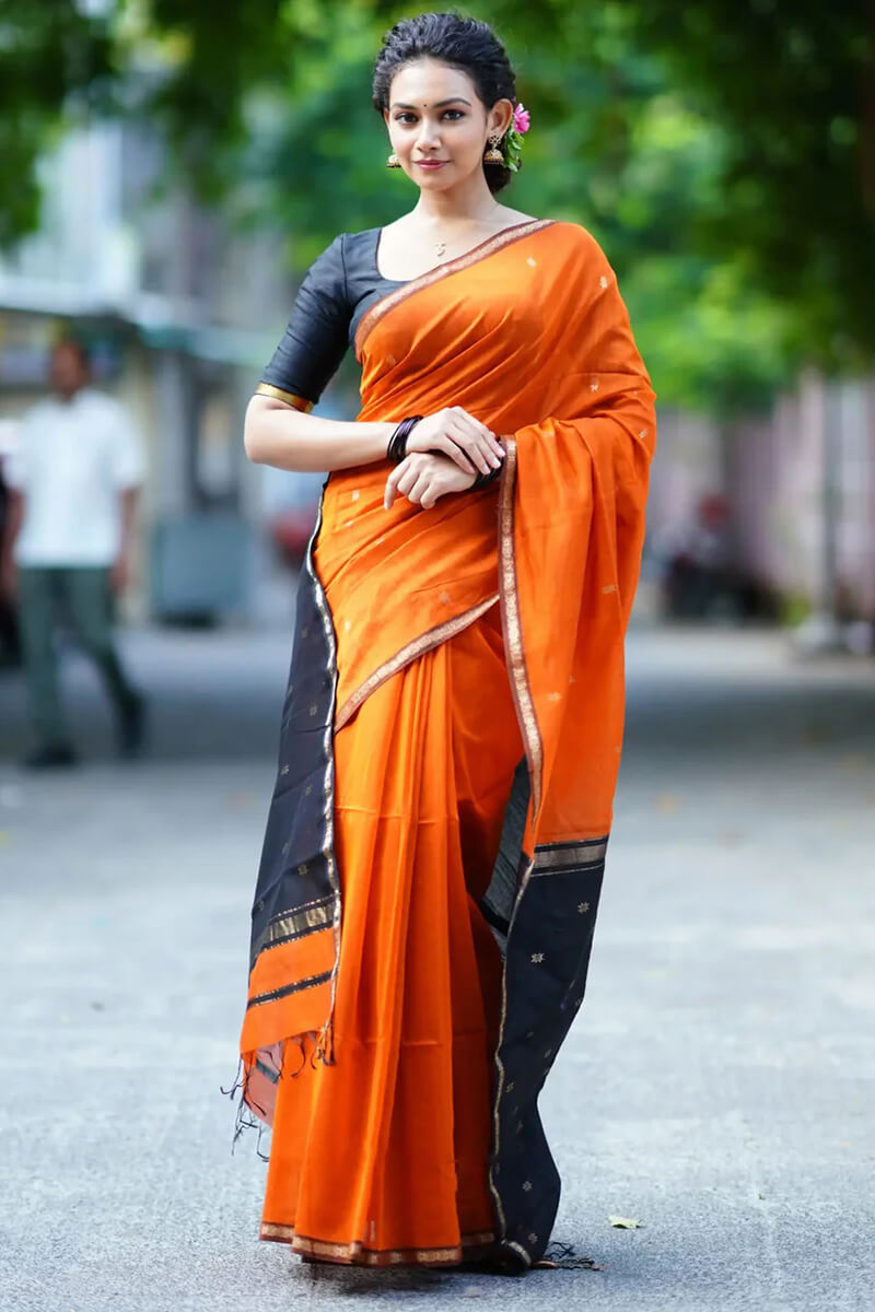 Intricate  Orange Cotton Silk Saree With Staring Blouse Piece