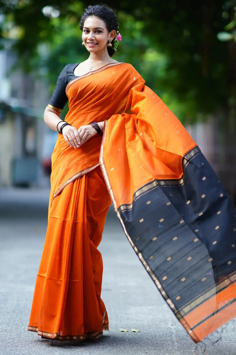 Intricate  Orange Cotton Silk Saree With Staring Blouse Piece