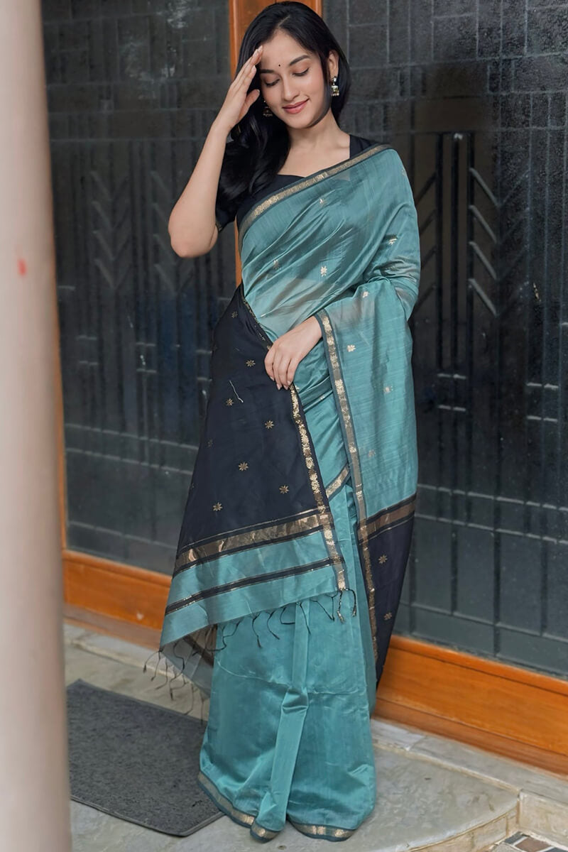 Twirling SeaGreen Cotton Silk Saree With Exceptional Blouse Piece