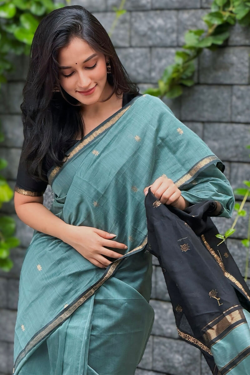 Twirling SeaGreen Cotton Silk Saree With Exceptional Blouse Piece