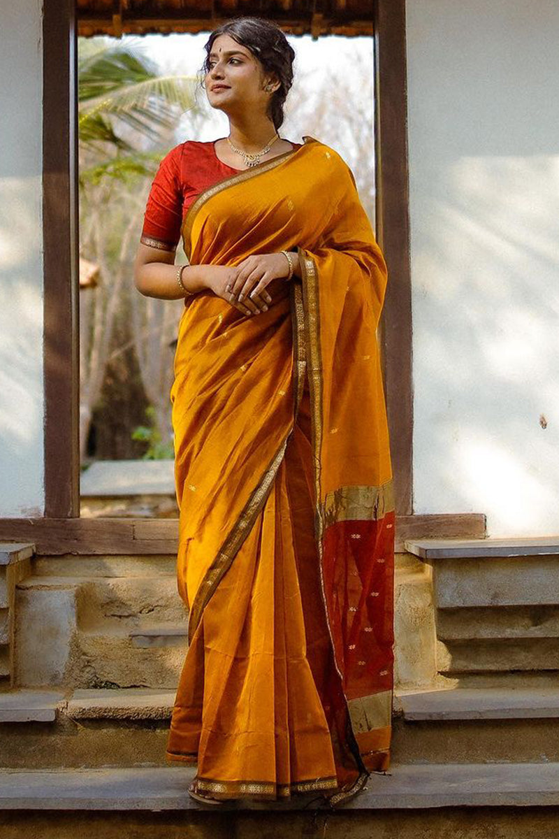 Engaging Yellow Cotton Silk Saree With Jubilant Blouse Piece