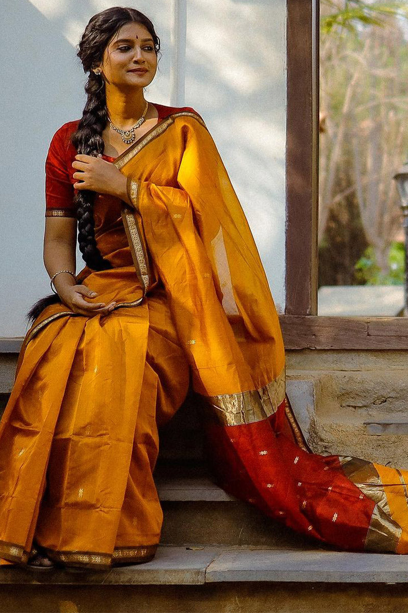 Engaging Yellow Cotton Silk Saree With Jubilant Blouse Piece