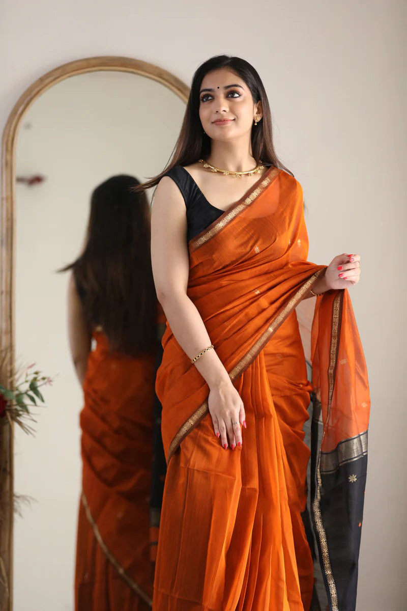 Splendiferous Orange Cotton Silk Saree With Ornate Blouse Piece