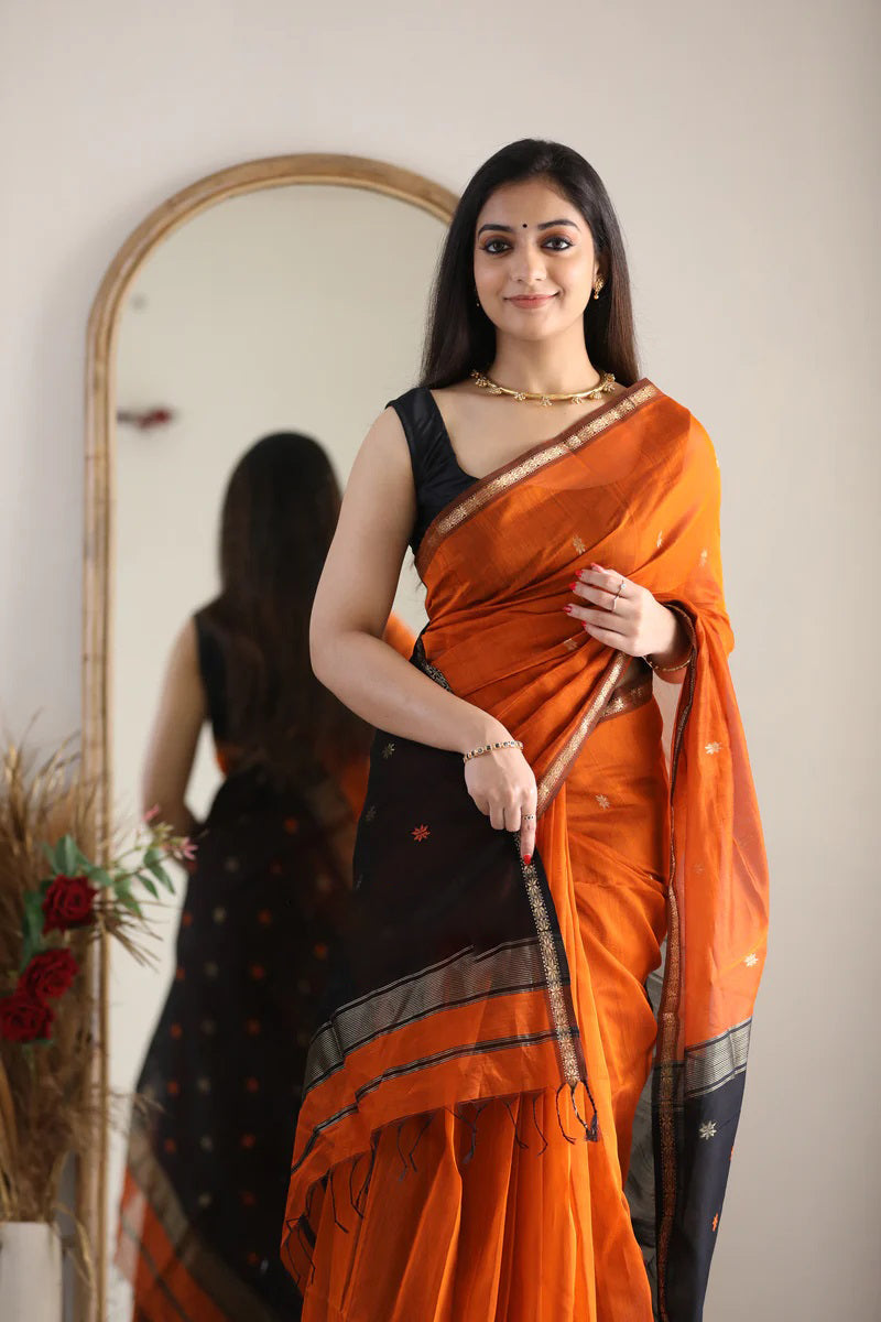 Splendiferous Orange Cotton Silk Saree With Ornate Blouse Piece