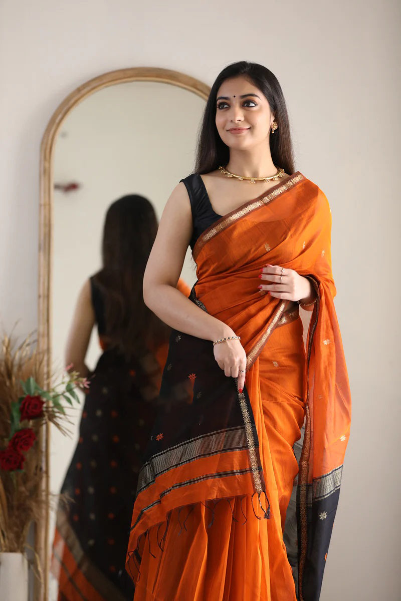 Splendiferous Orange Cotton Silk Saree With Ornate Blouse Piece