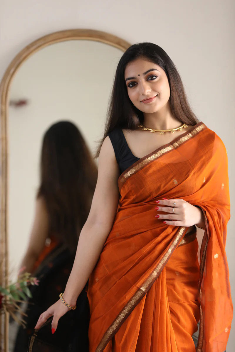 Splendiferous Orange Cotton Silk Saree With Ornate Blouse Piece