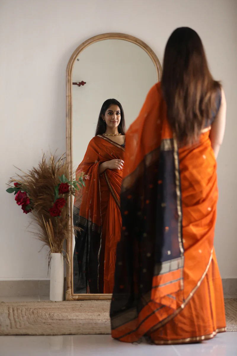 Splendiferous Orange Cotton Silk Saree With Ornate Blouse Piece