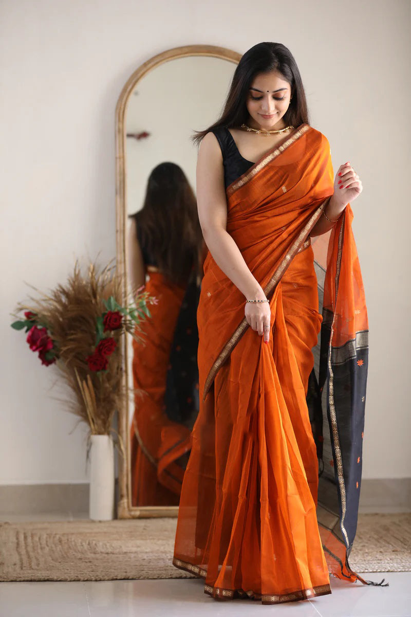 Splendiferous Orange Cotton Silk Saree With Ornate Blouse Piece