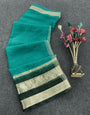 Blissful Sea Green Organza Silk Saree With Epiphany Blouse Piece