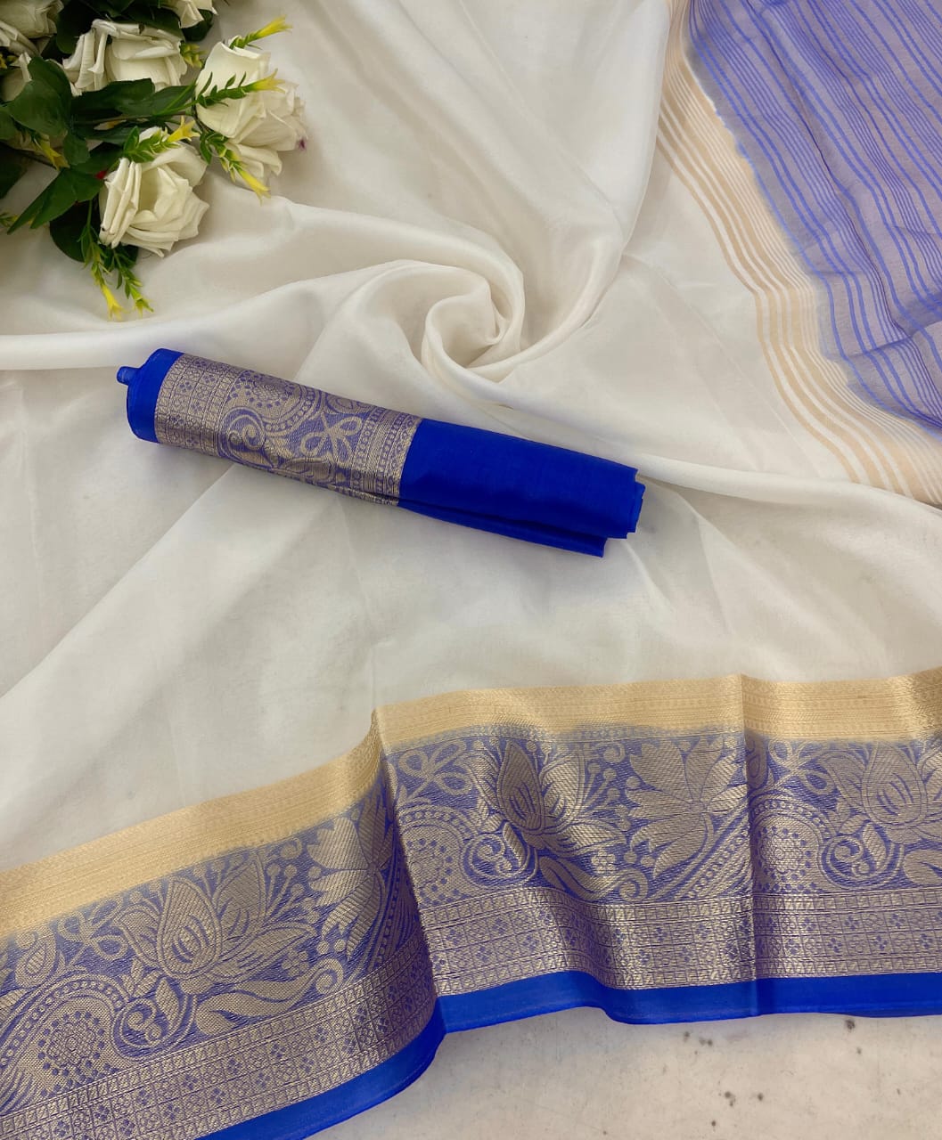 Efflorescence White and Blue Orgenza Silk Saree With Tempting Blouse Piece