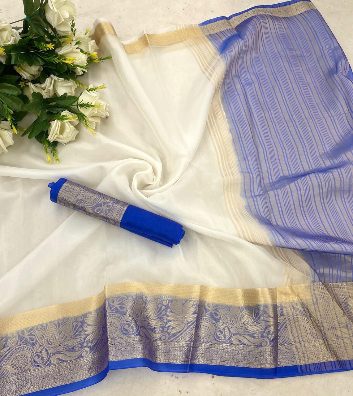 Efflorescence White and Blue Orgenza Silk Saree With Tempting Blouse Piece