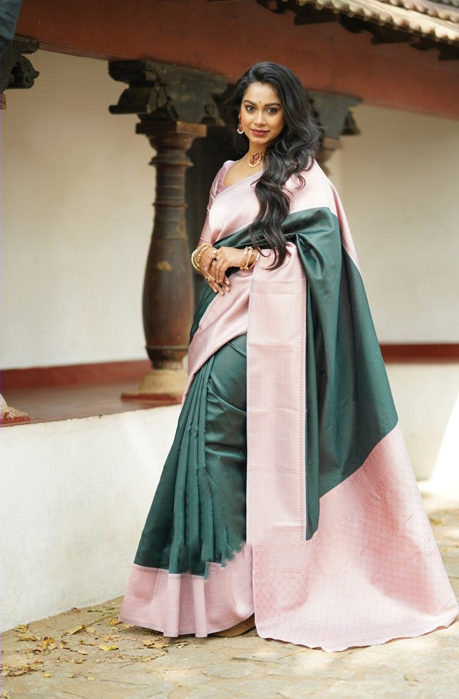 Resonant Dark Green Soft Silk Saree With Gratifying Blouse Piece