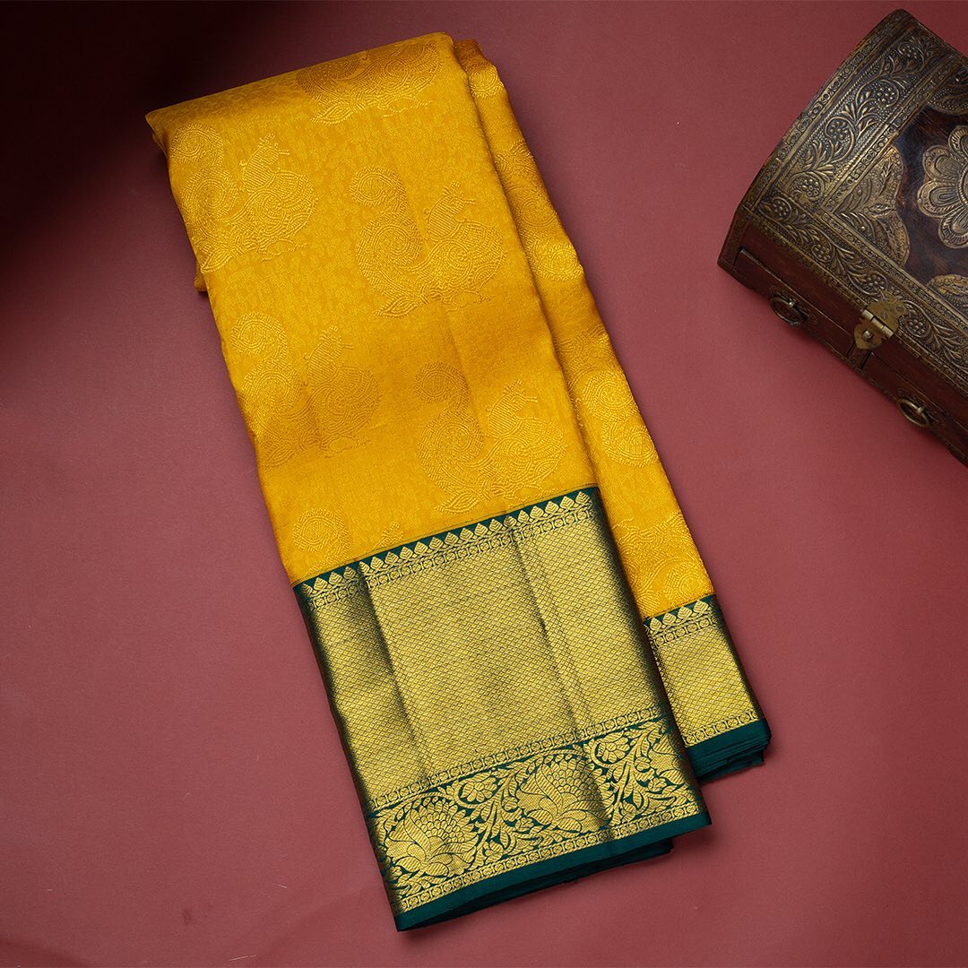 Redolent Yellow Soft Banarasi Silk Saree With Ornate Two Blouse Piece