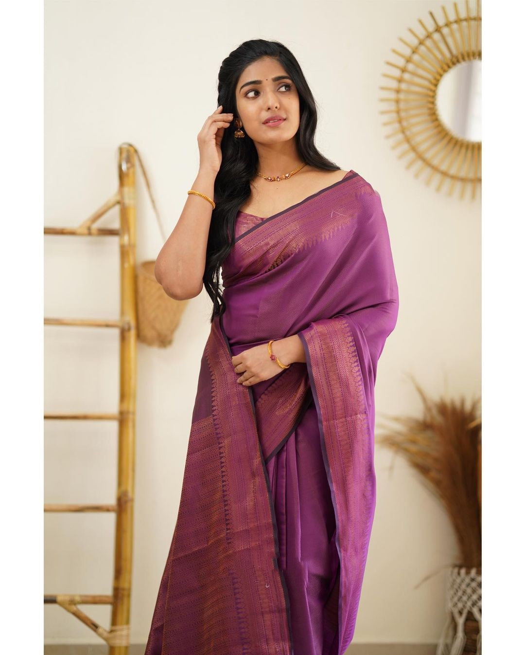 Evocative Purple Soft Silk Saree With Gossamer Blouse Piece