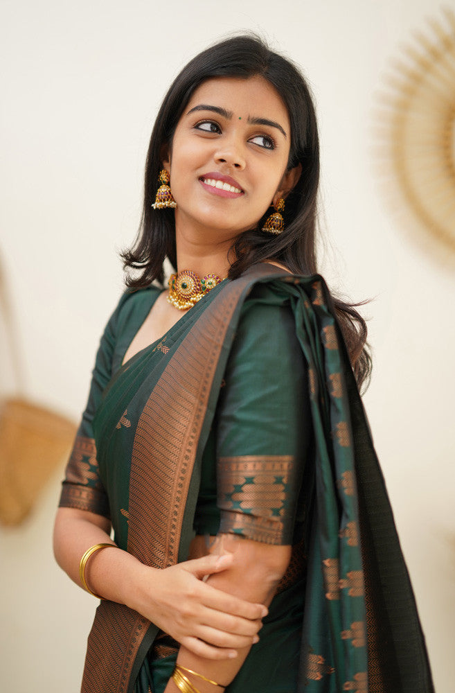 Attractive Dark Green Soft Silk Saree With Desirable Blouse Piece