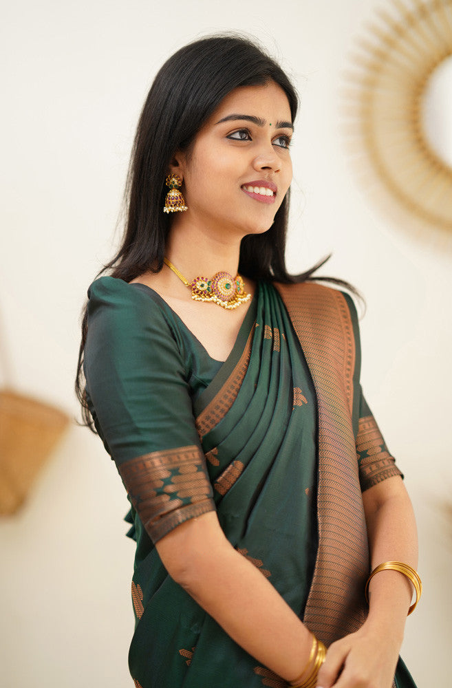 Attractive Dark Green Soft Silk Saree With Desirable Blouse Piece