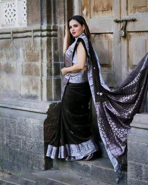 Beguiling Black Soft Banarasi Silk Saree With Girlish Blouse Piece