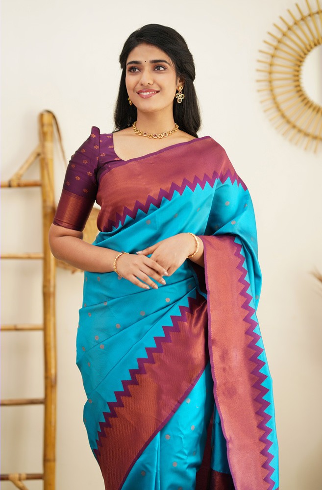 Elegant Firozi Soft Banarasi Silk Saree With Majesty Blouse Piece