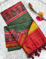 Super extravagant Dark Green Ikkat Printed Patola Silk Saree With Effulgent Blouse Piece