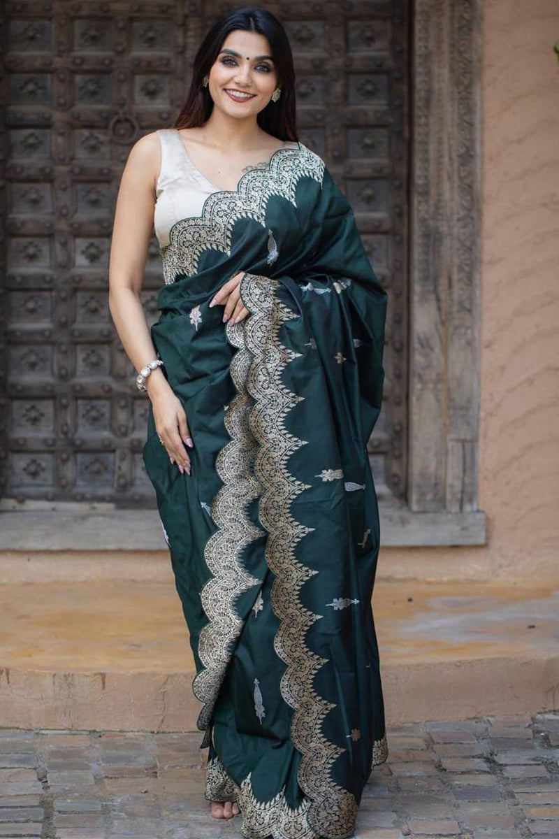 Sonorous Dark Green Soft Silk Saree With Wonderful Blouse Piece