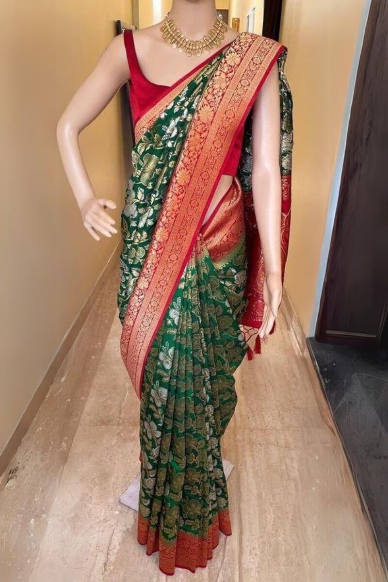 Engaging Dark Green Soft Silk Saree With Improbable Blouse Piece