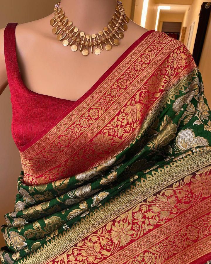 Engaging Dark Green Soft Silk Saree With Improbable Blouse Piece