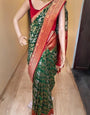 Engaging Dark Green Soft Silk Saree With Improbable Blouse Piece