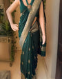 Tantalizing Dark Green Soft Silk Saree With Gleaming Blouse Piece