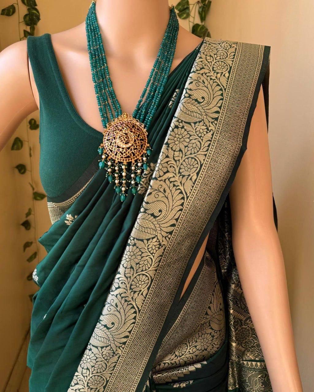 Tantalizing Dark Green Soft Silk Saree With Gleaming Blouse Piece