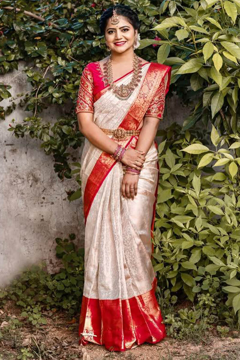 Cynosure Off White Soft Silk Saree With Extraordinary Blouse Piece