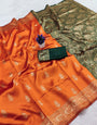 Capricious Orange Soft Silk Saree With Verdant Blouse Piece