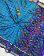 Eye-catching Firozi Soft Printed Patola Silk Saree with Surreptitious Blouse Piece